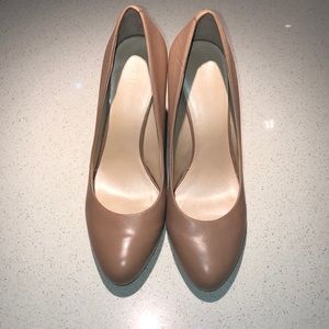 Nine West nude heels with gold detail on heel